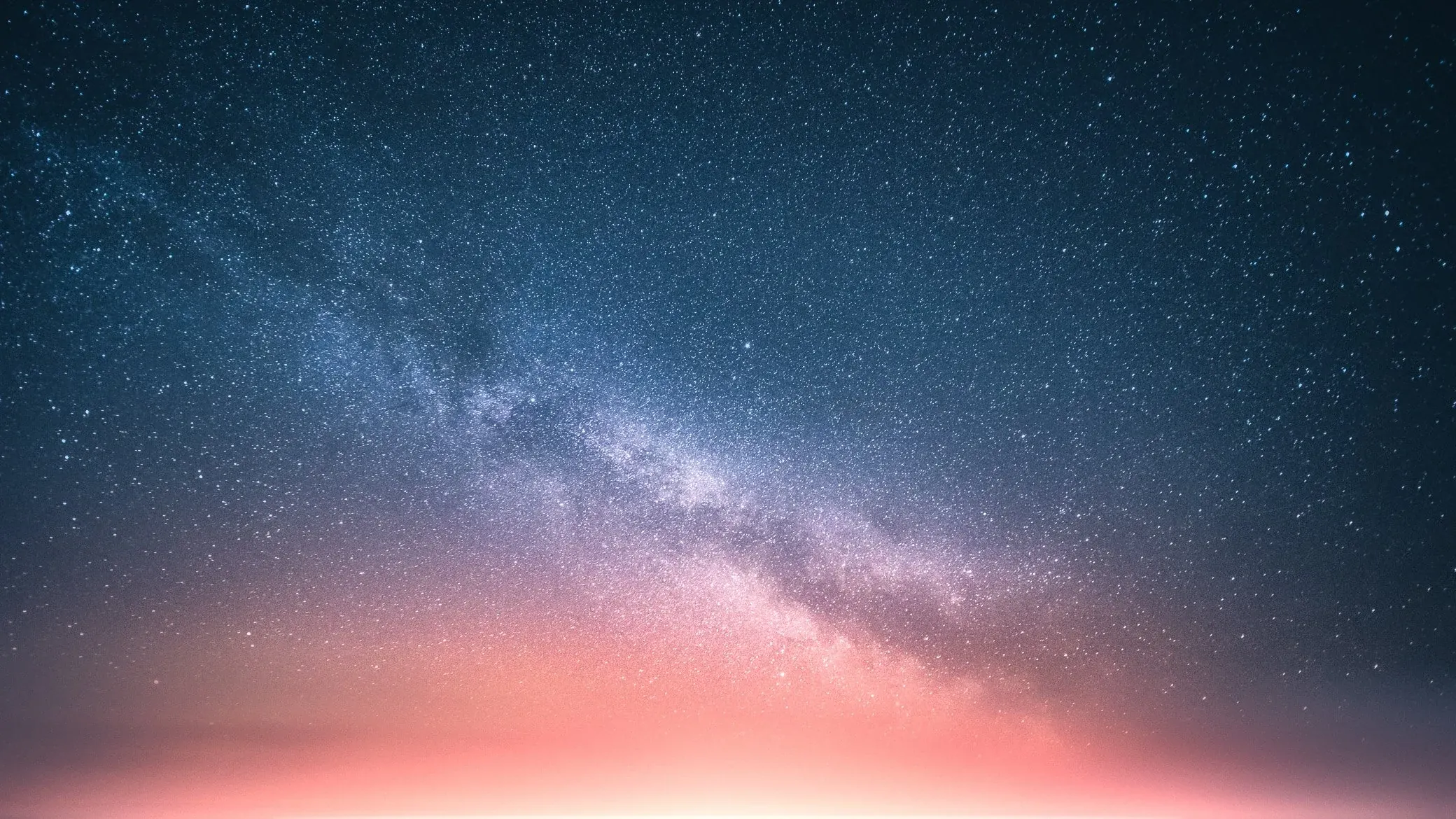 Day-to-night composite landscape example with rocky shore and starry sky