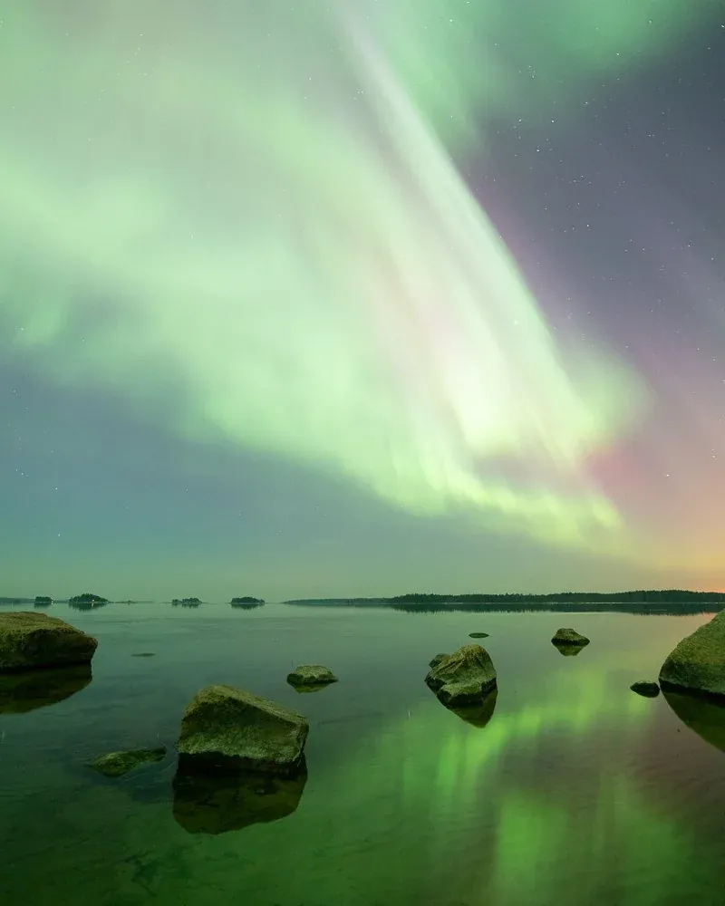 Before edit of a northern lights landscape before Borealis grading