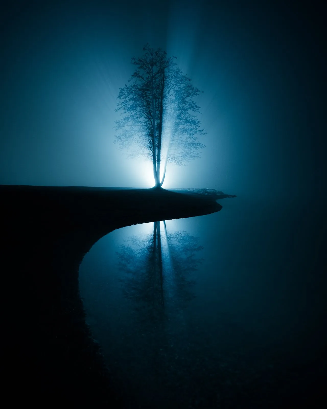 Yin Yang, a minimal winter landscape photograph from the Resilience collection by Mikko Lagerstedt.