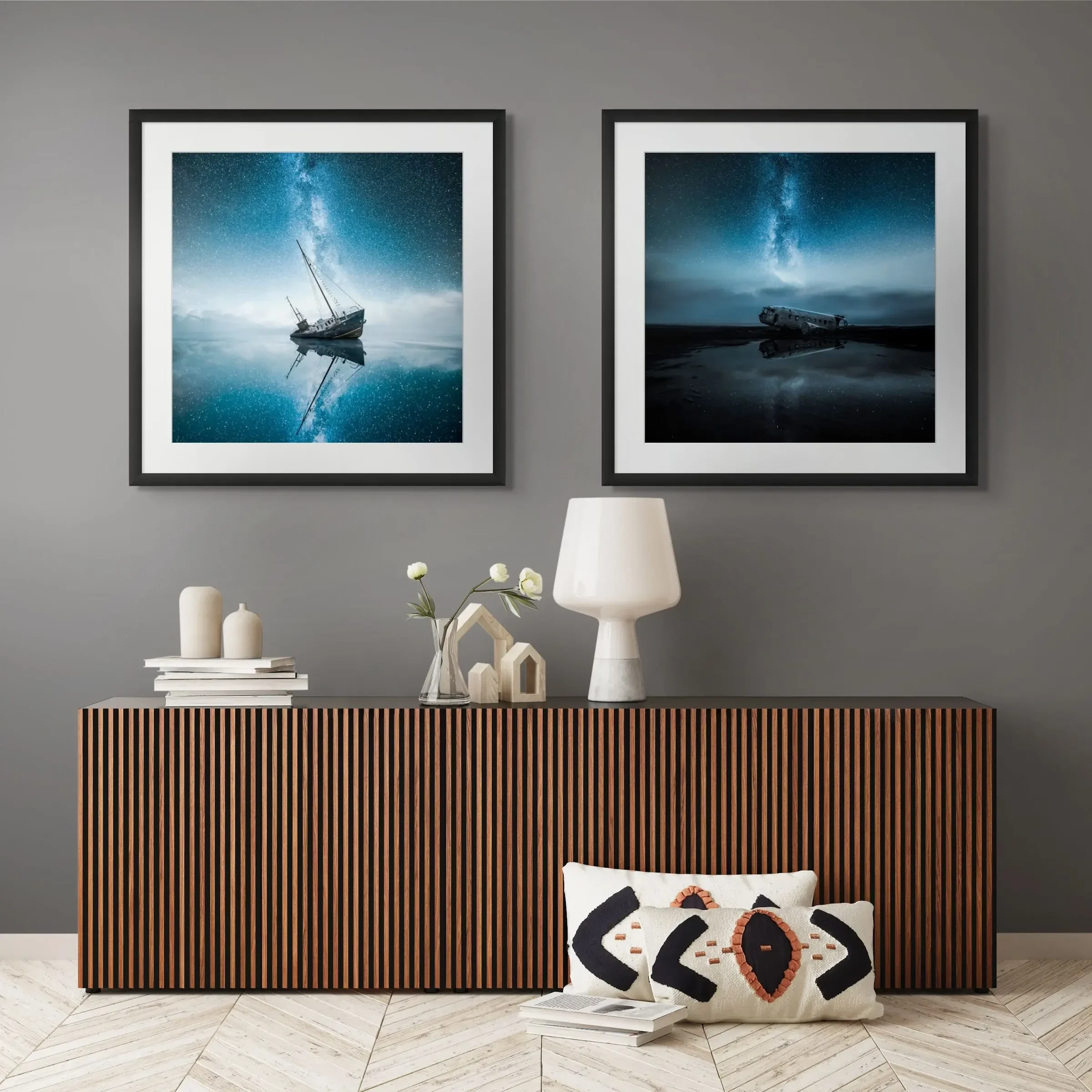 Two framed fine art prints placed above a sideboard in a styled interior